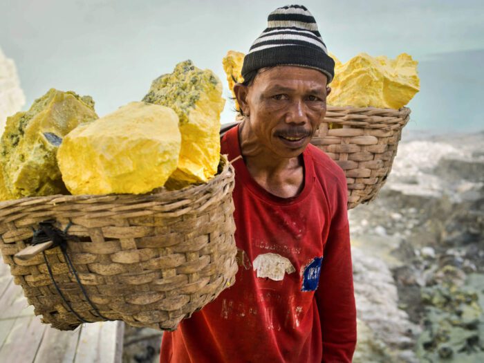 Sulfur miners at kawah ijen