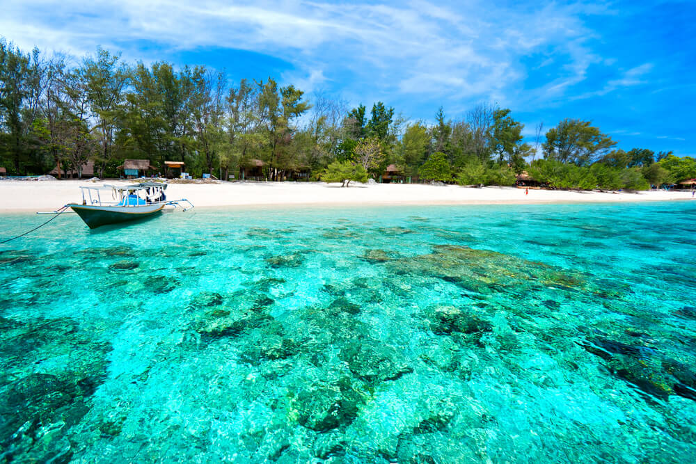 Clear shallow water and reef beside Gili Meno