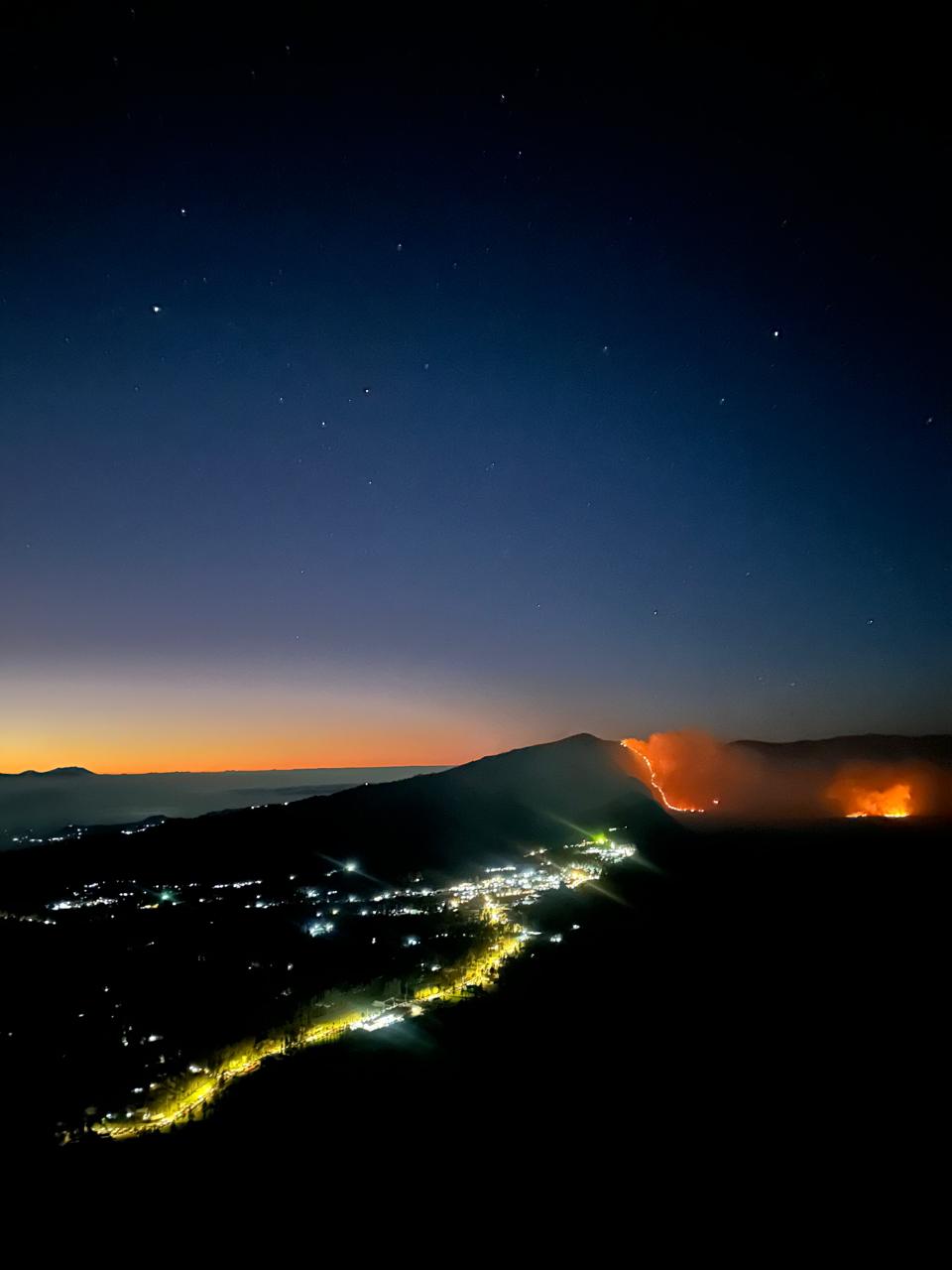 Wildfire near Mount Bromo seen from a viewpoint in August 2026